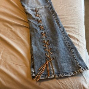 Lei bell bottom jeans with leather lace up detail